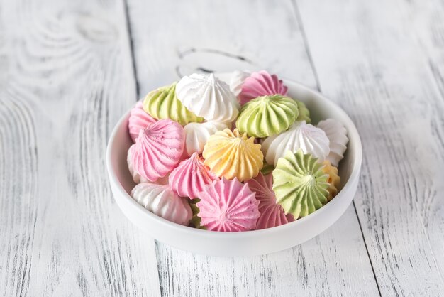 Bowl of colored meringues