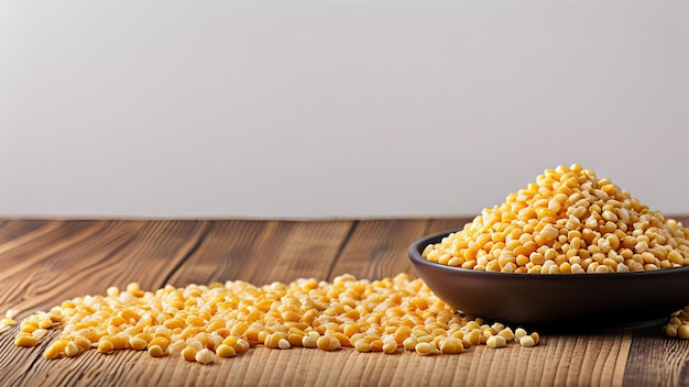 Photo a bowl of corn is on a wooden table