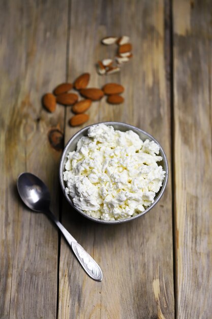 A bowl of cottage cheese and almonds