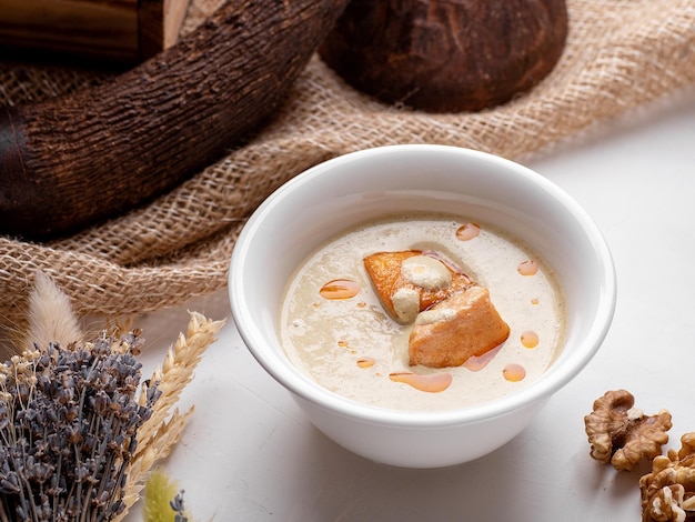 Bowl of cream soup with salmon