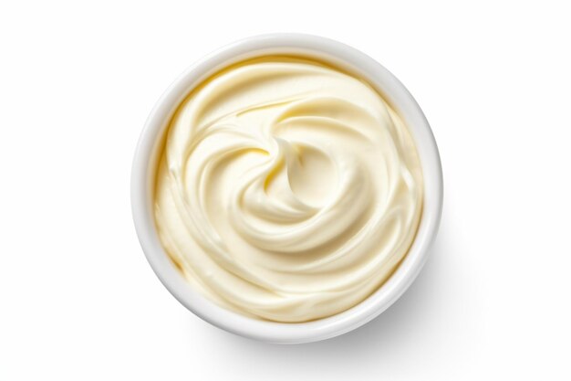 Photo a bowl of cream on a white surface