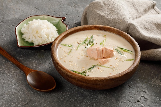 Bowl of creamy soup with salmon
