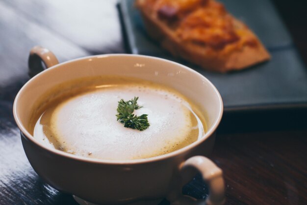 A bowl of delicious homemade cream of mushroom soup background