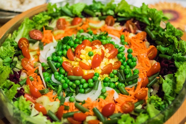 Bowl filled with fresh vegetarian salad