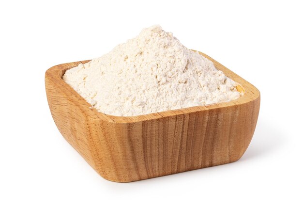 Bowl of flour on white background