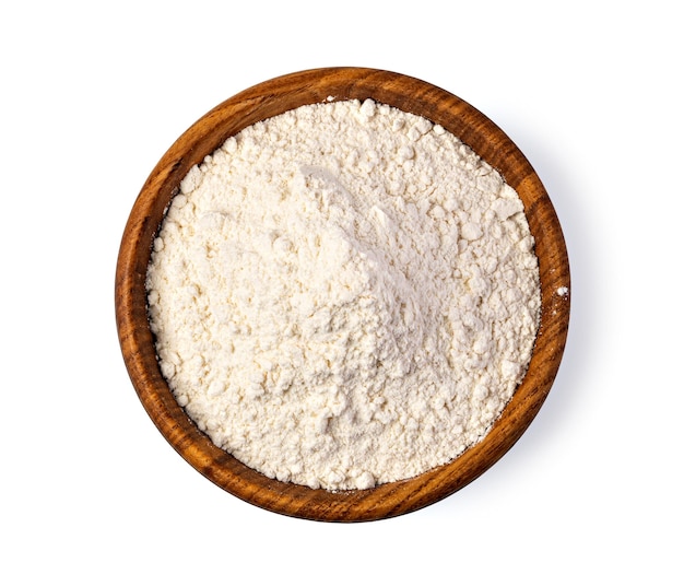 Bowl of flour on white background