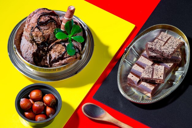 A bowl of food with a yellow and red tablecloth on it