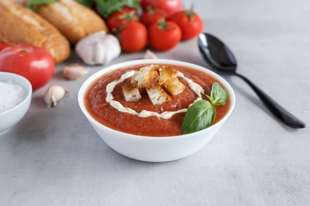 A bowl of fresh gazpacho. Cold tomato soup.