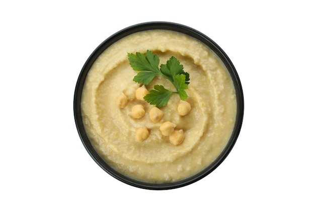 Bowl of fresh hummus isolated on white