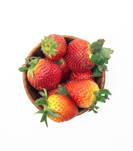 bowl of fresh strawberries on white background top angle