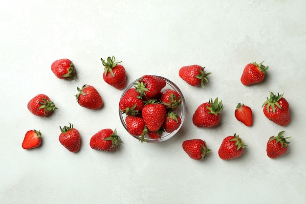 Bowl of fresh strawberry on white