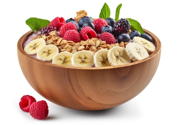 A bowl of fruit and granola with a few berries