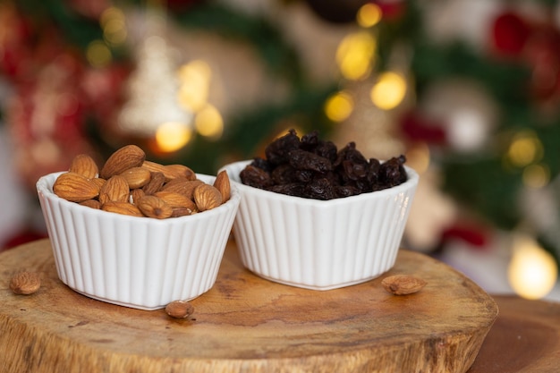 Bowl full of almonds and raisins Christmas time