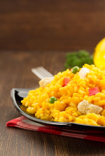 Bowl full of rice on wooden