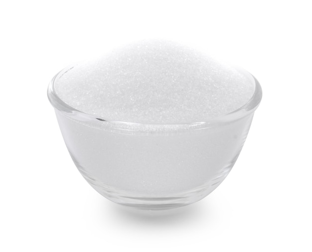 Bowl glass of sugar isolated on white background.