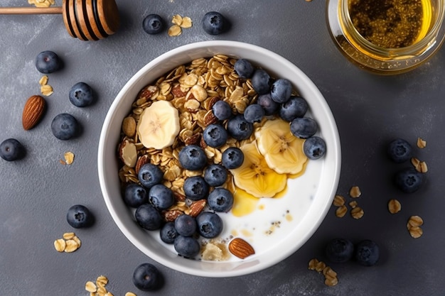 Bowl of greek yogurt with oatmeal granola banana blueberry nuts chia seeds and honey on gray table Top view generate ai