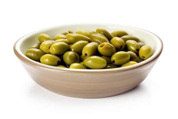 A bowl of green olives on a white background