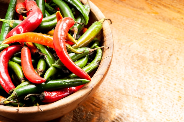 Bowl of green and red chillies