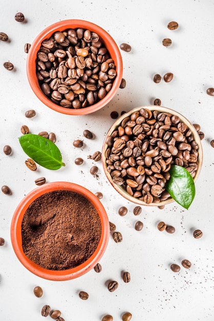 Bowl of ground coffee and beans