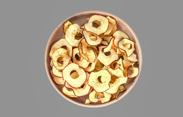 Bowl of homemade dried organic apple chips