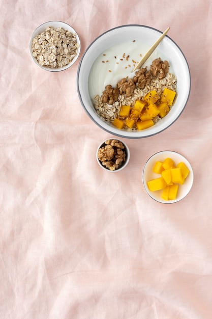 Bowl of homemade granola with yogurt and cereals