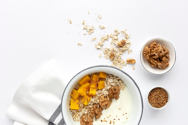 Bowl of homemade granola with yogurt and cereals