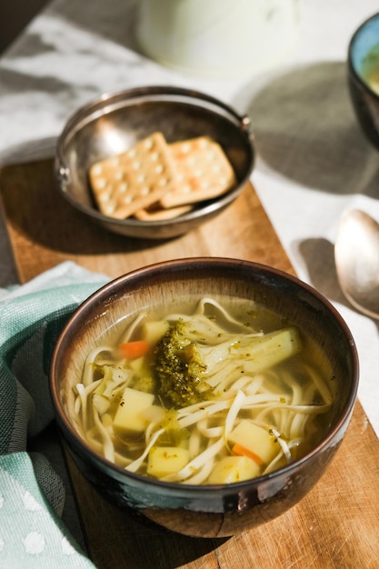 Bowl of homemade vegetable soup with noodles