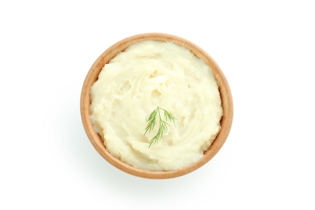 Bowl of mashed potatoes isolated on white