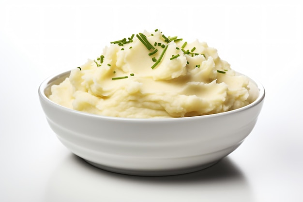 a bowl of mashed potatoes with chives