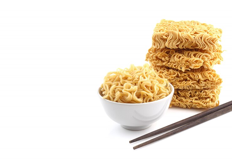 Bowl of noodles  and heap of dry noodle with chopsticks