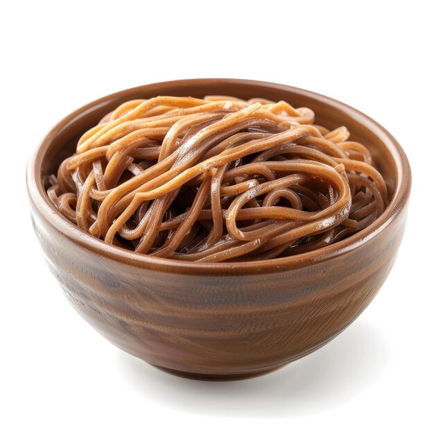 Photo a bowl of noodles with brown sauce on it