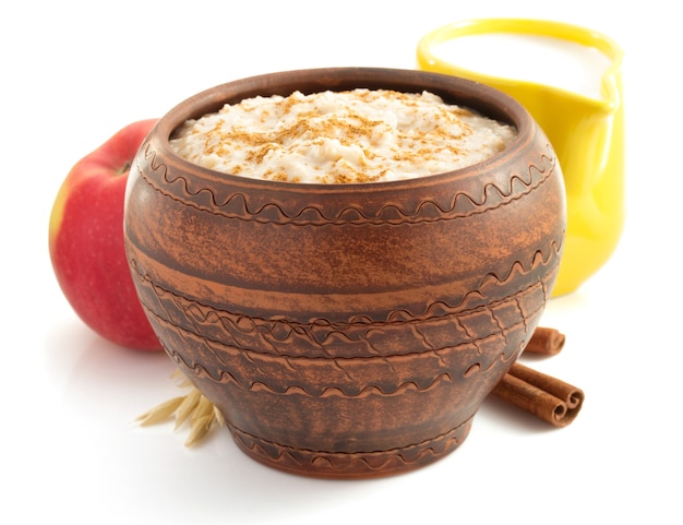 Bowl of oatmeal isolated on white