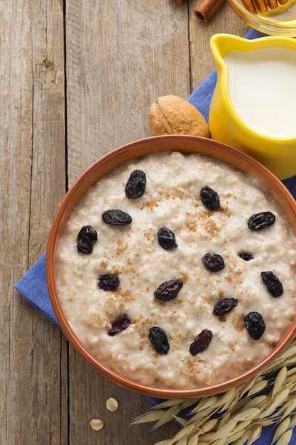 Bowl of oatmeal on wood