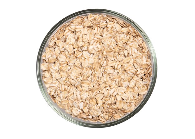 Bowl of oats porridge isolated on a white background. Healthy breakfast