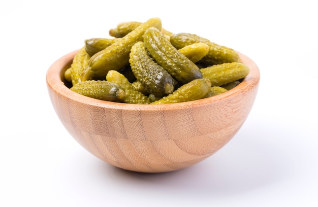 Bowl of pickled cucumber isolated on white