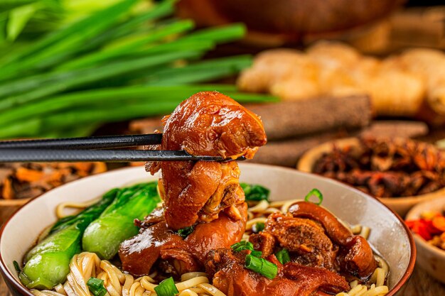 A bowl of pork knuckle noodles