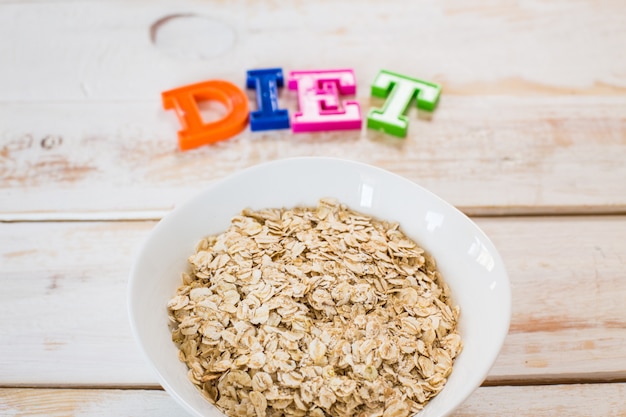 Bowl of porridge on wooden table