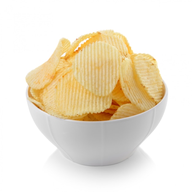 Bowl of potato chips on white background