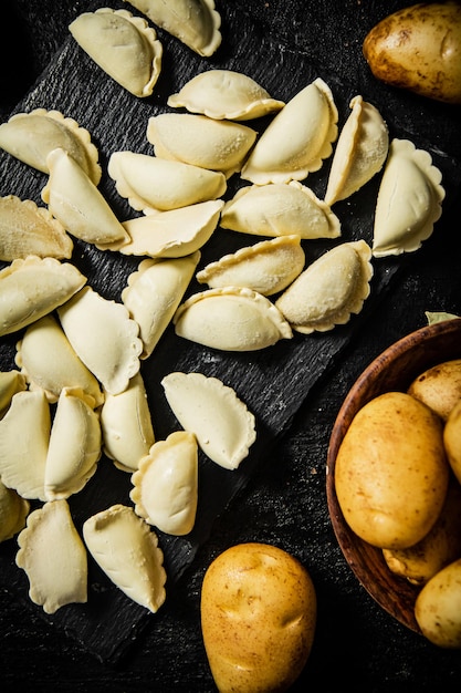 A bowl of potatoes and a bowl of potatoes