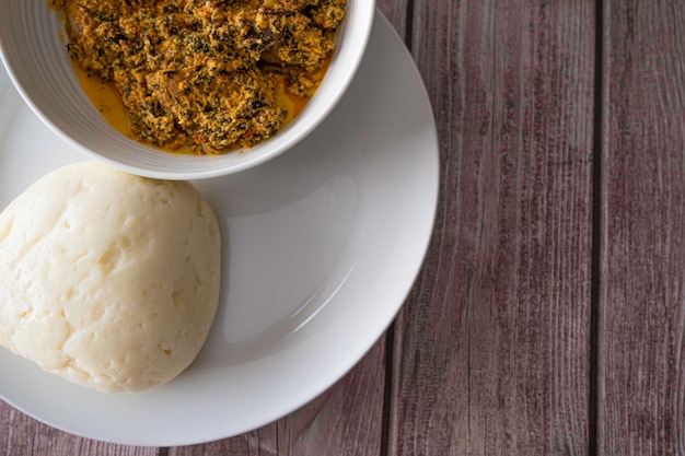 Bowl of Pounded Yam served with Egusi Melon Soup