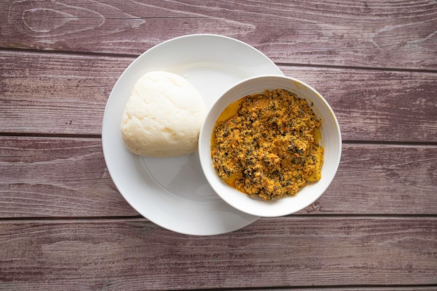 Bowl of Pounded Yam served with Egusi Melon Soup