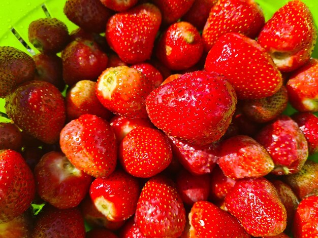 Bowl of ripe fresh delicious red strawberries