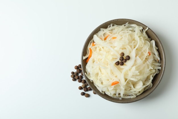 Bowl of sauerkraut on white, top view