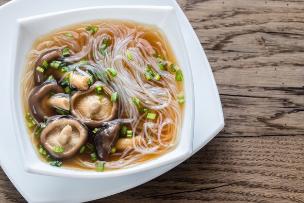 Bowl of shiitake soup on the wooden table