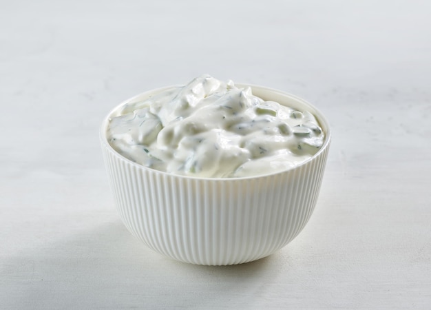 Photo bowl of sour cream or greek yogurt