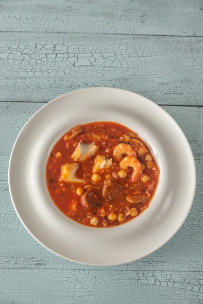 Bowl of spanish fish and chorizo soup
