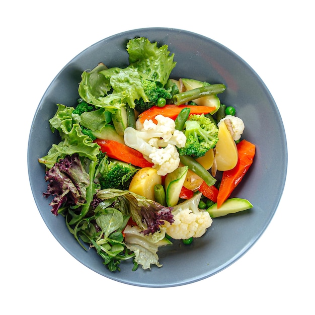 Bowl of steamed vegetables and greens