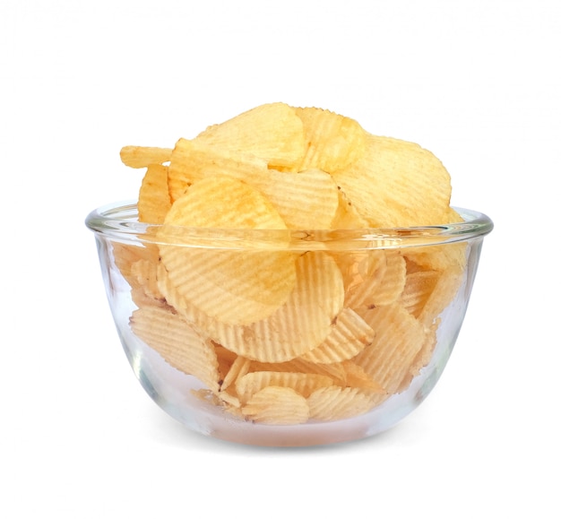 Photo bowl of tasty ridged potato chips on white background. this has clipping path