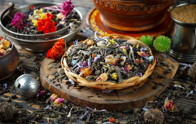 Photo a bowl of tea with a few flowers on it