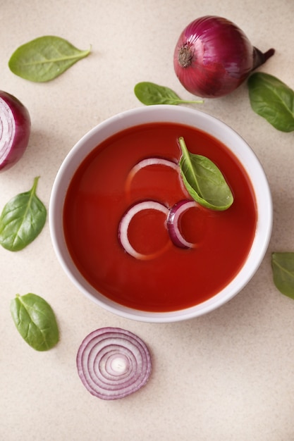 Bowl of tomato soup on kitchen table